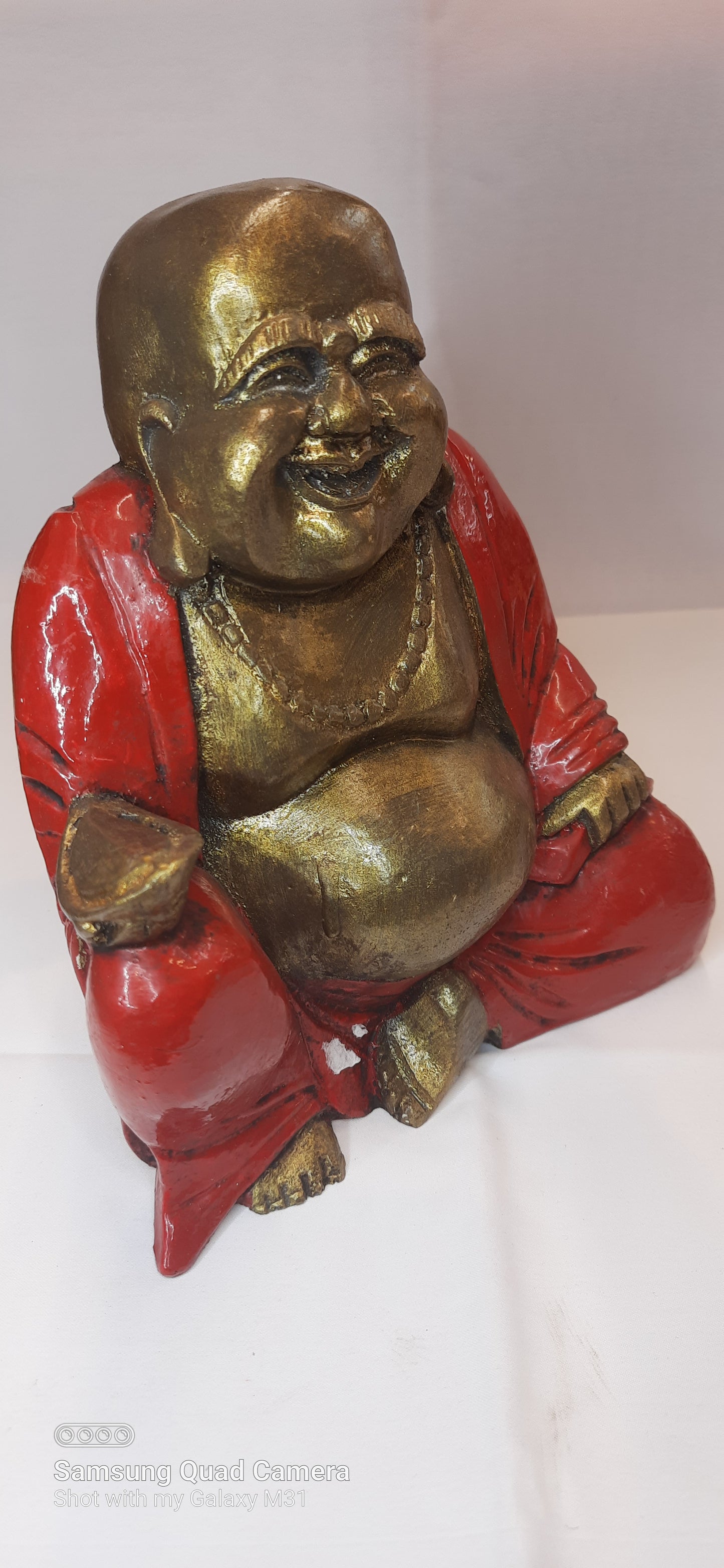 Laughing Buddha Statue Size: 10 inches (Height) x 8 inches (Width) x 6 inches (Depth)